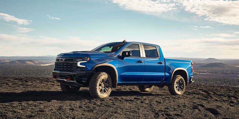 2023 Chevrolet Silverado 1500 parked on a dirt terrain